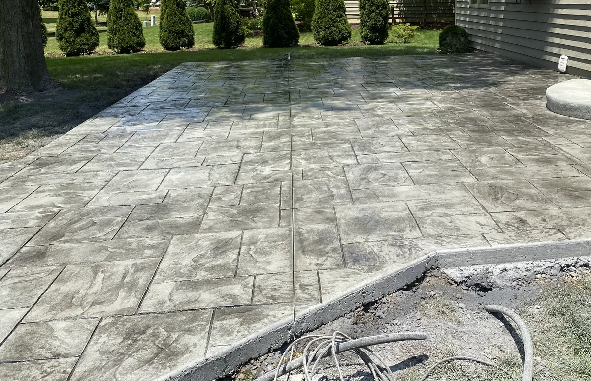 Finished broom-finish concrete driveway in a Schaumburg neighborhood