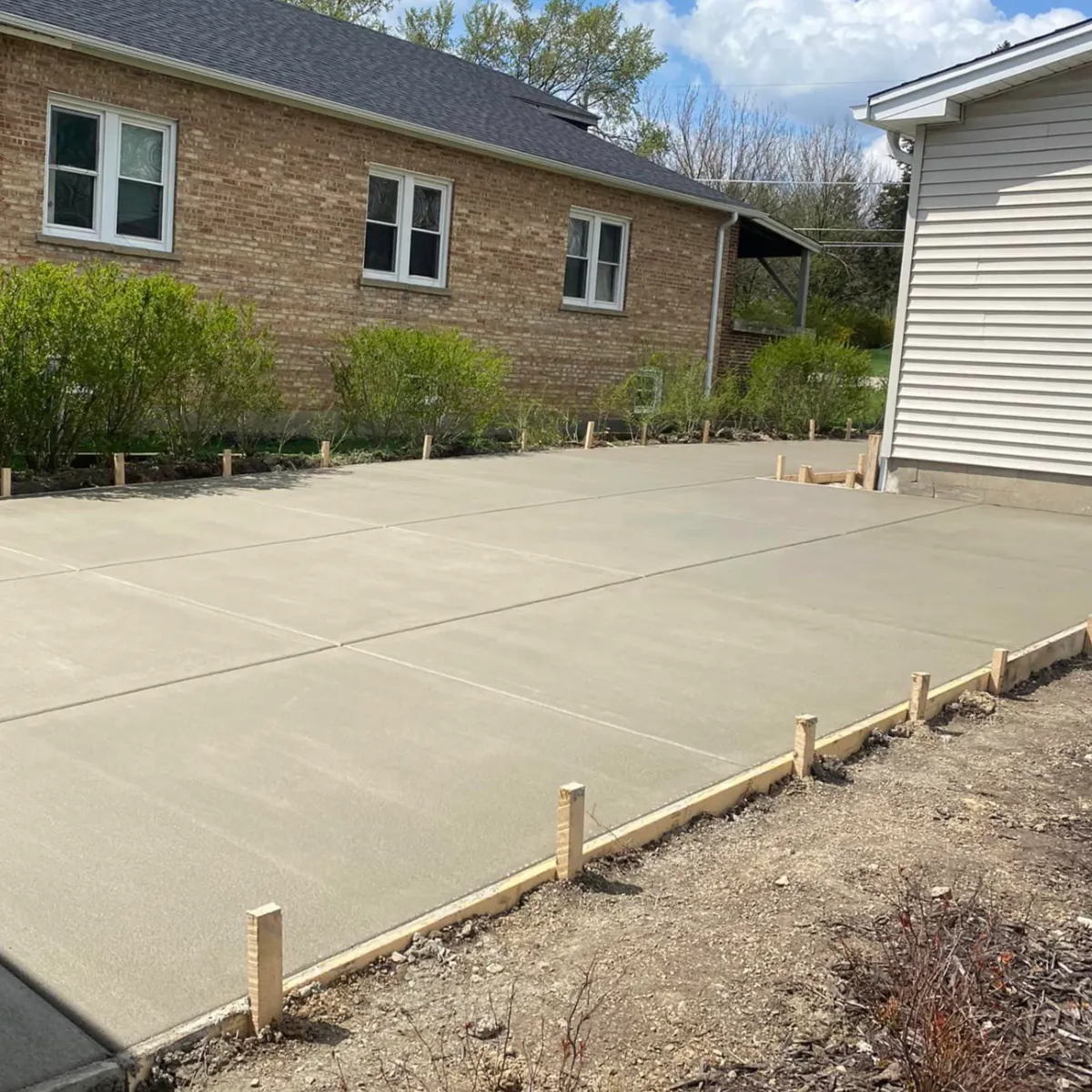 Stamped concrete patio in a slate pattern with integral color